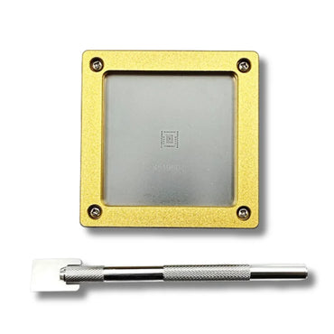 KF1980E tin tool kit in operation, stainless scraper depositing solder paste through the stencil onto a Whatsminer M60 ASIC chip.