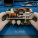 Bitmain APW7 PSU with PFC + LLC architecture and PCIE output cable on repair workbench — repair guide