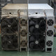 Comparison of a worn refurbished ASIC miner and a freshly repaired unit on a workshop bench