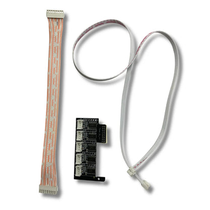 Close-up of Antminer voltage regulator board with 4-pin voltage cable and 18-pin data cable for test fixture.